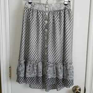 Double layer ruffle hem skirt with flower buttons